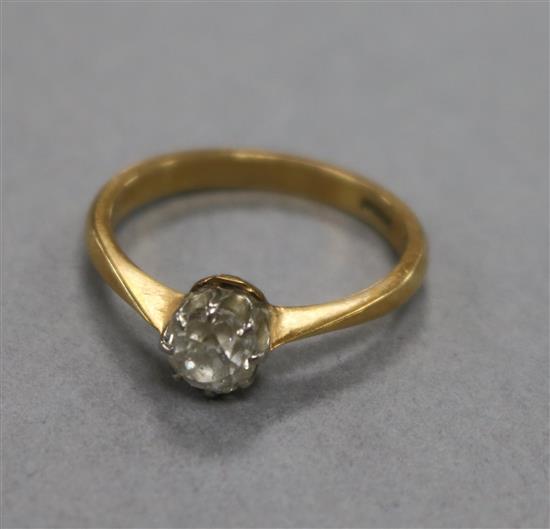 An 18ct gold and solitaire diamond ring, size L.